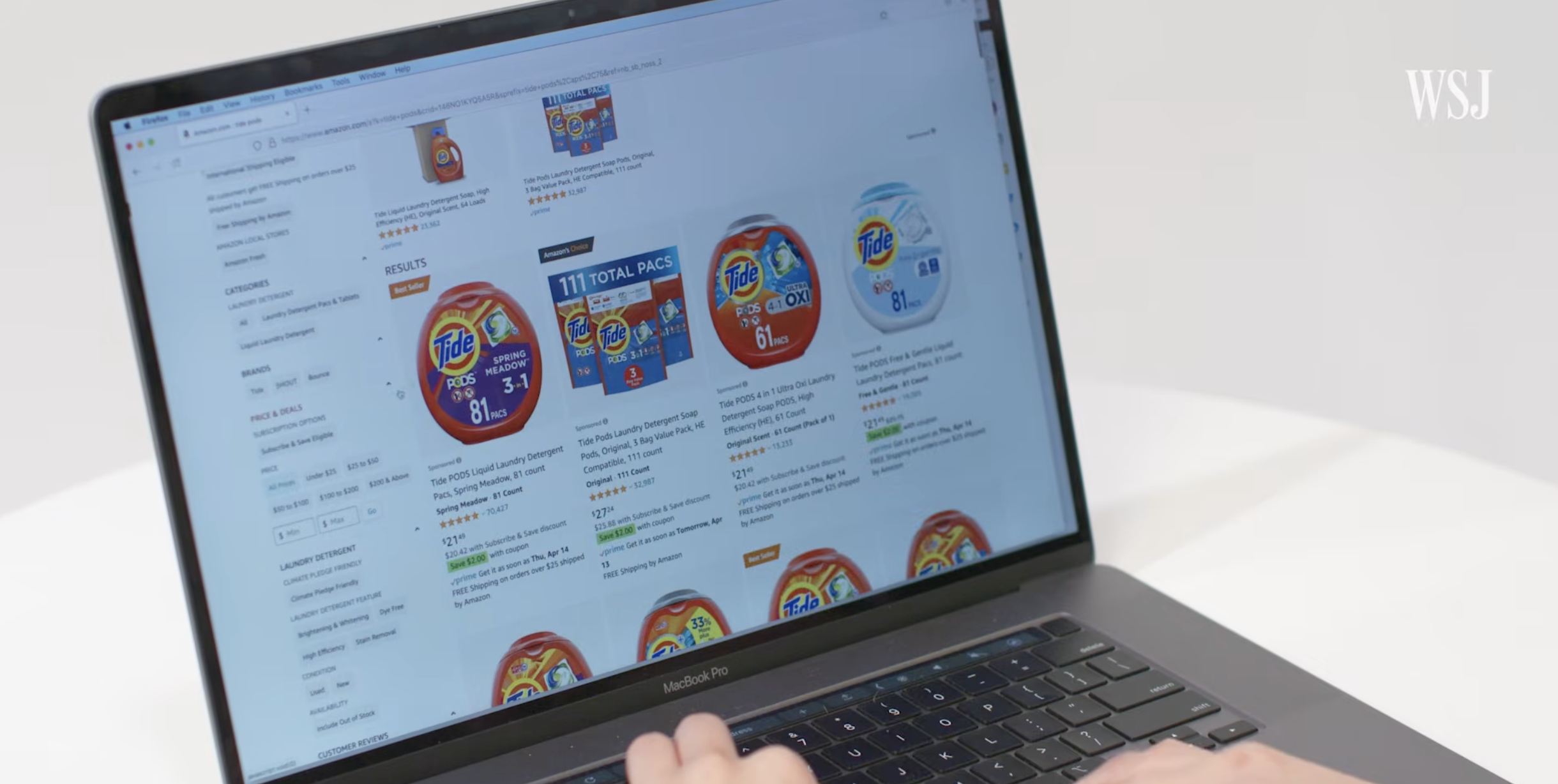 An image of someone purchasing Tide pods on amazon on a computer.